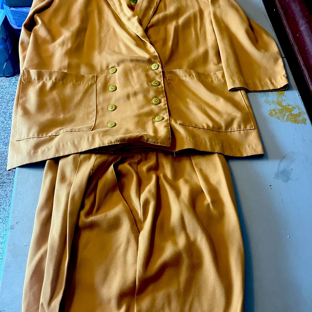 Three piece ladies suit.